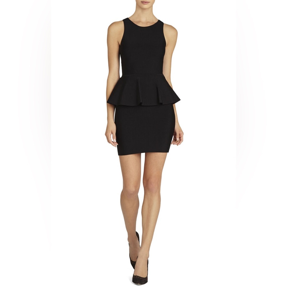 BCBGMaxAxzria Peplum Short Dress  Size Medium 
Black. Thin horizontal ribbing.